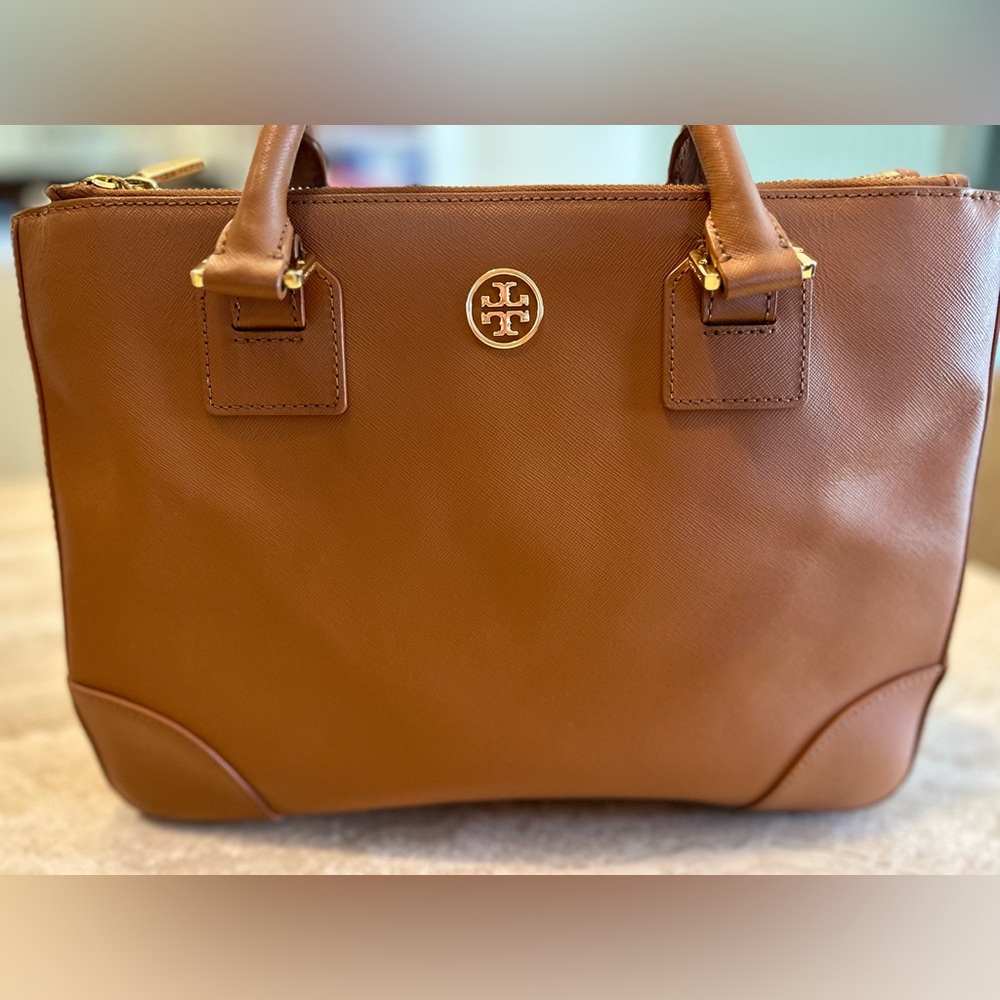 (d) Tory Burch Brown Leather Tote Bag.